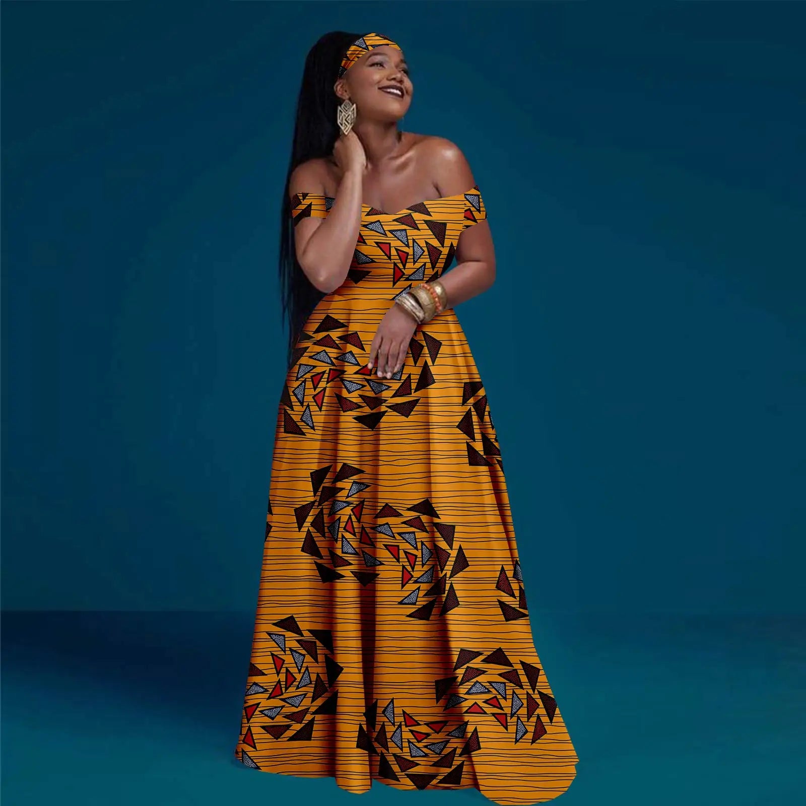 Woman wearing a traditional patterned dress against a blue background