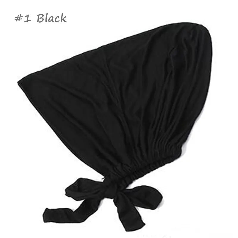 Black adjustable headwrap featuring a soft fabric and tie-back design, ensuring a comfortable and secure fit.