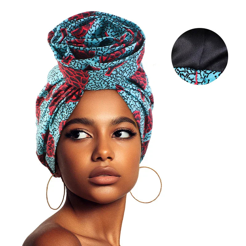 Blue and red Afrocentric Melody Headwrap with satin lining, designed for comfort and style. Ideal for women looking for a chic and protective headwear option.