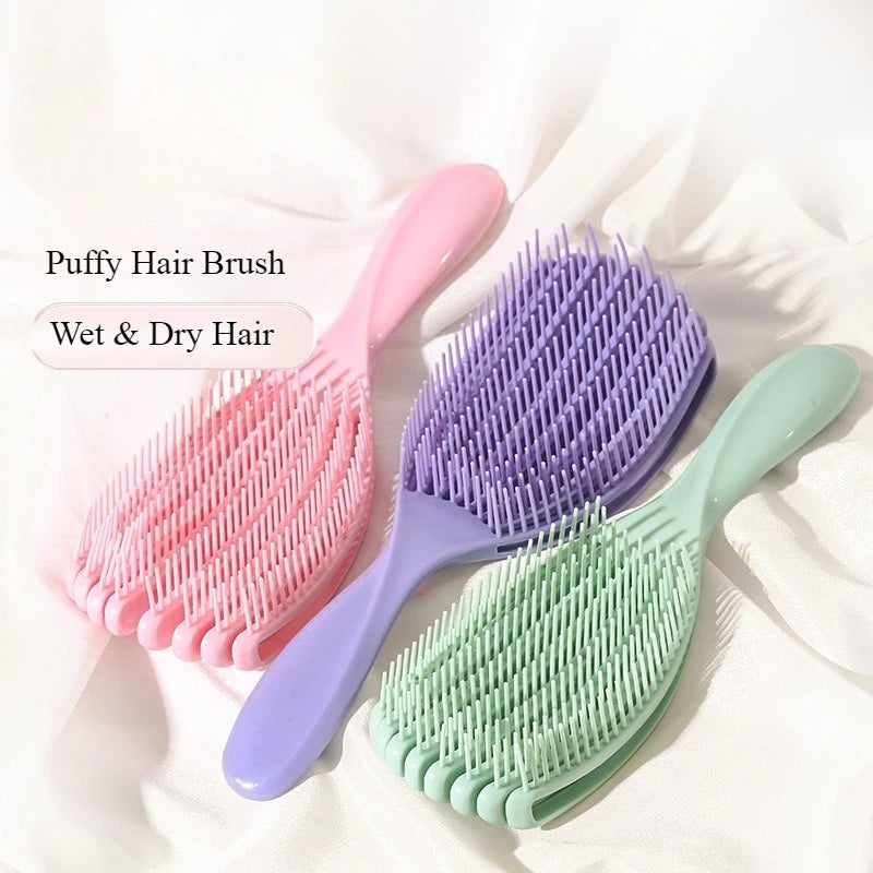 the pink, purple and green shell shape detangling hair brush for Natural Hair and Locs. Painless