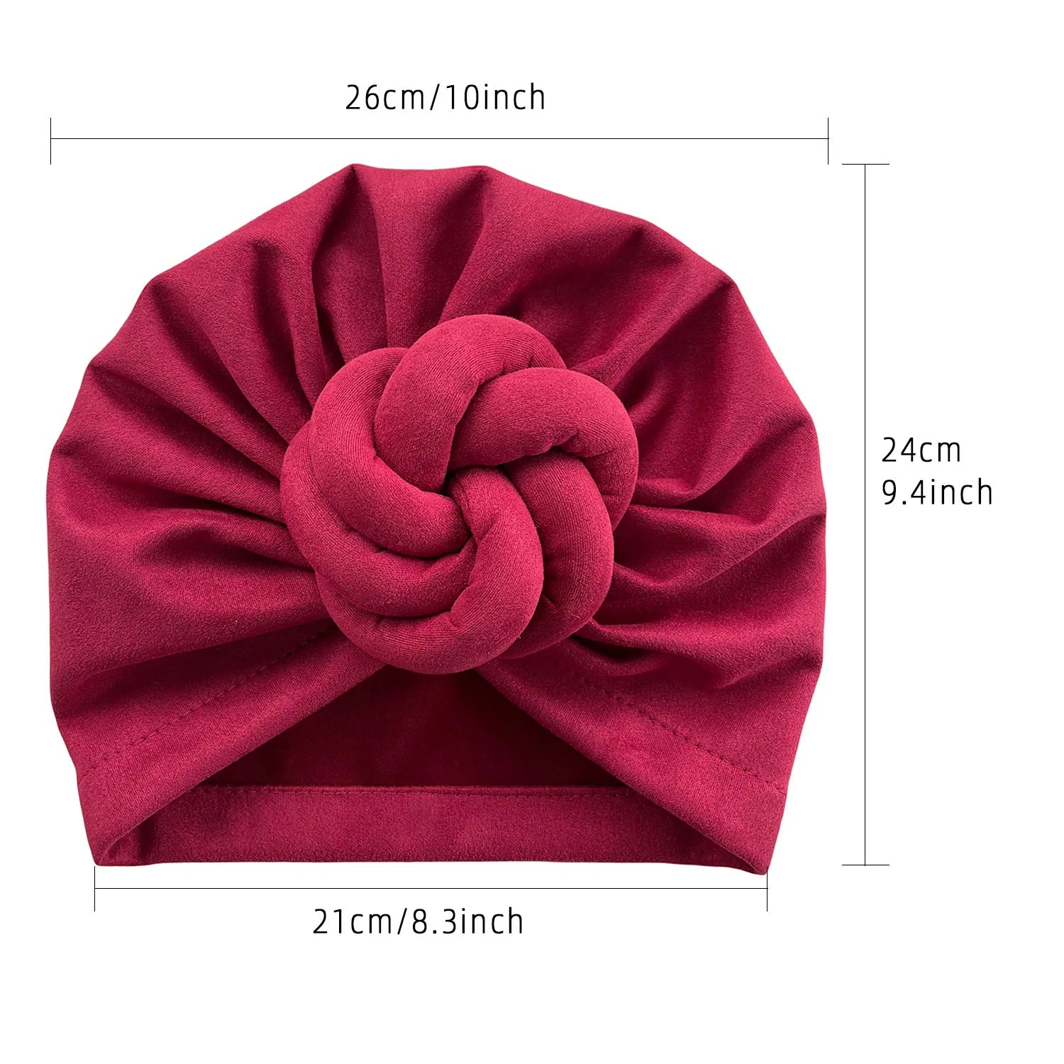 Size dimensions of the soft knotted turban headwrap, measuring 26cm in width, 24cm in height, and 21cm in opening width.