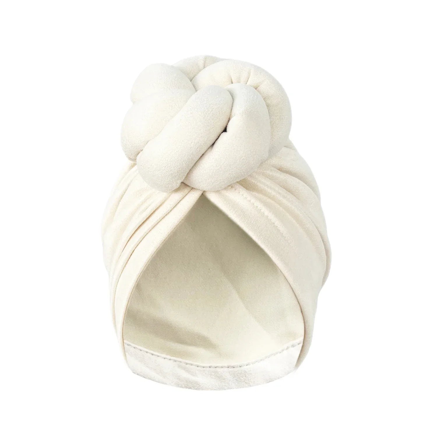 Beige soft knotted turban headwrap with a smooth fabric and stylish knot, offering a sophisticated look.