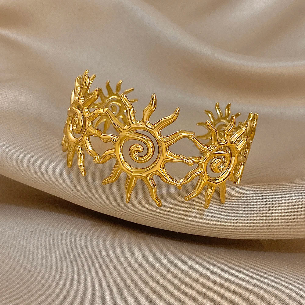 Front Angle of The Gold Spiral Sun Hair Cuff with Matching Bracelet