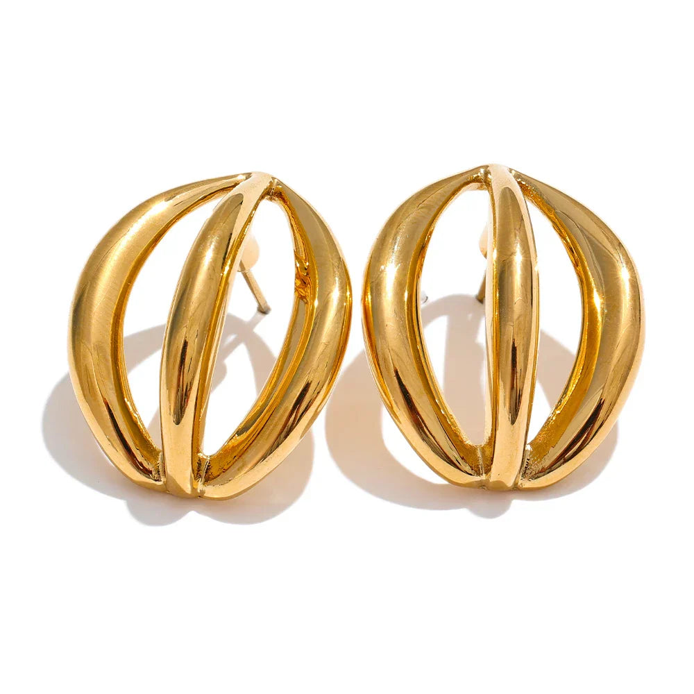 Close-up of gold stainless steel half-round geometric hollow stud earrings. A bold and elegant jewelry piece for women.