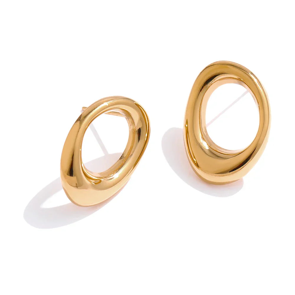 Gold stainless steel round hollow stud earrings with a sleek and polished finish. Timeless and elegant jewelry piece for women’s accessories.