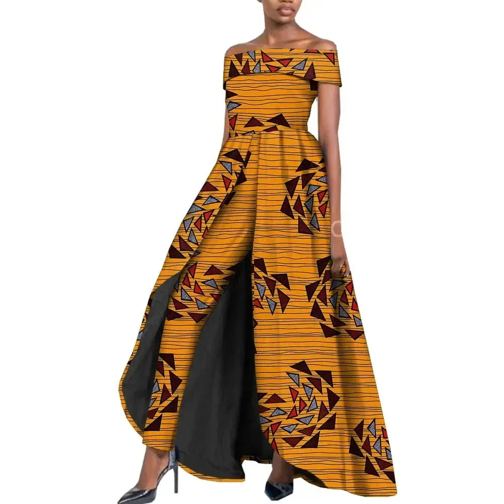 Stylish African pantsuit for women in vibrant yellow with traditional patterns. Made from 100% cotton, featuring a custom fit and elegant flowing design.