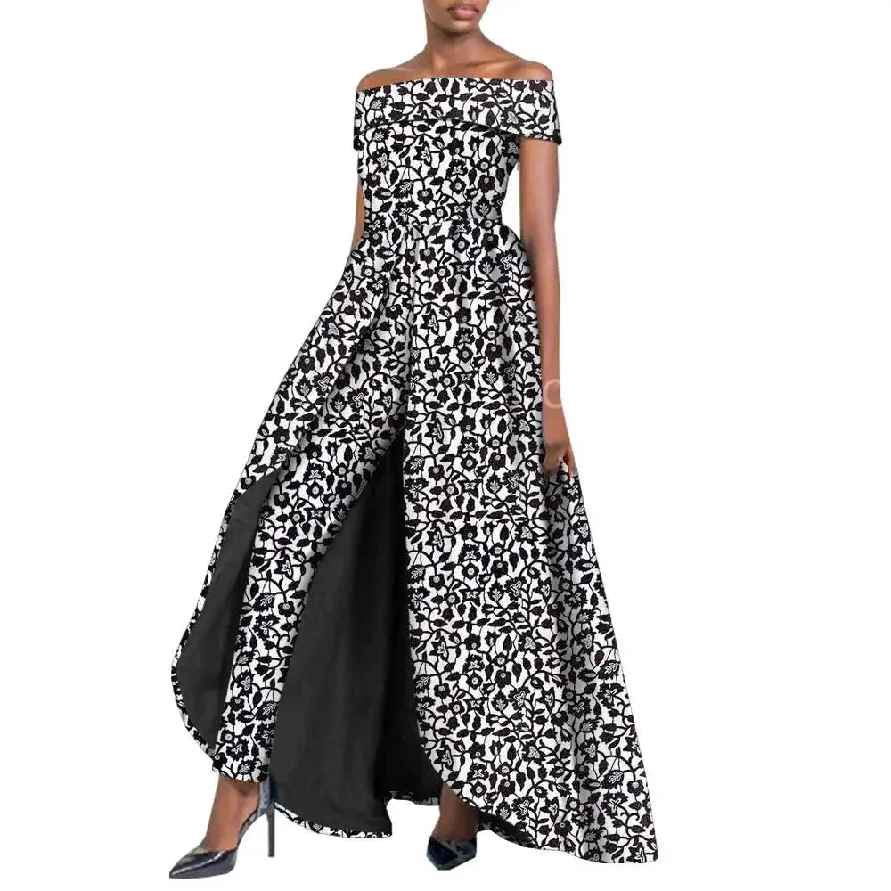 Elegant African pantsuit for women in black and white print. Off-shoulder design with a flowing cape, made from 100% cotton for comfort and style.