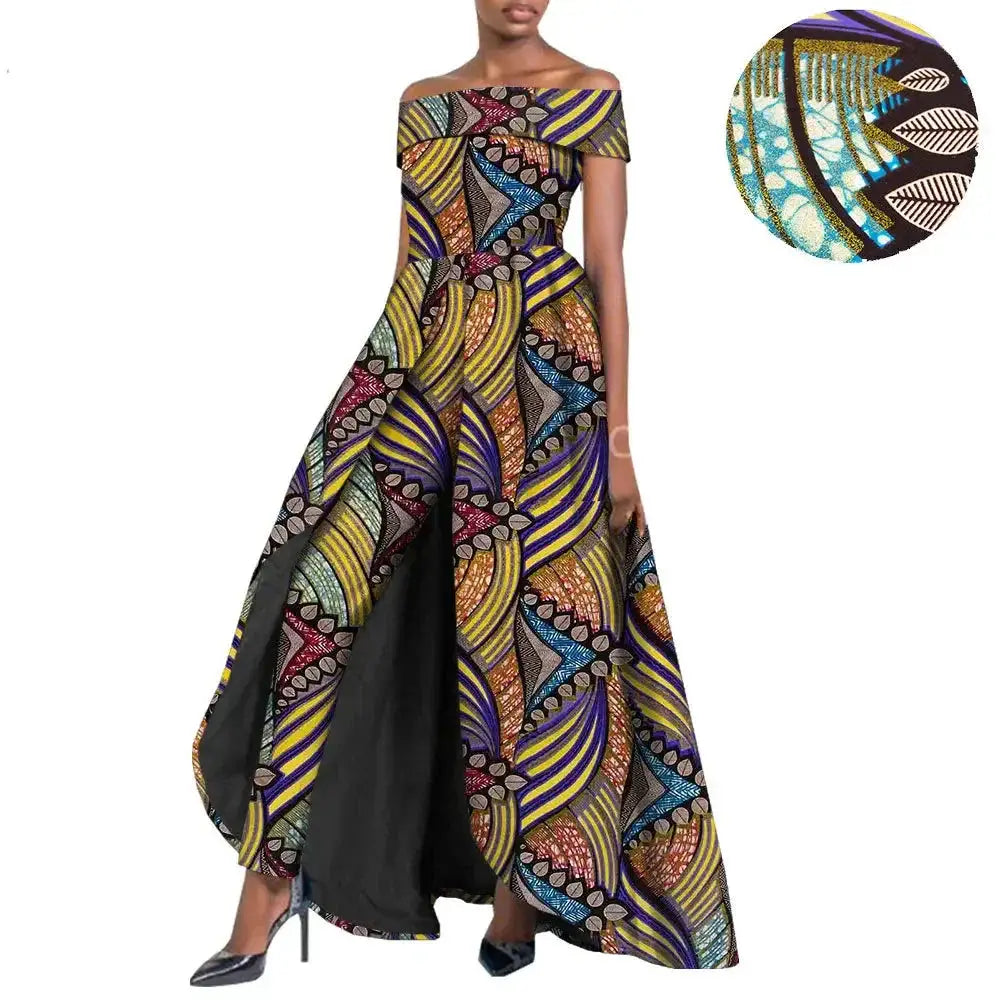 Elegant African pantsuit for women in multicolored abstract print. Off-shoulder design with a flowing cape, made from breathable 100% cotton fabric.