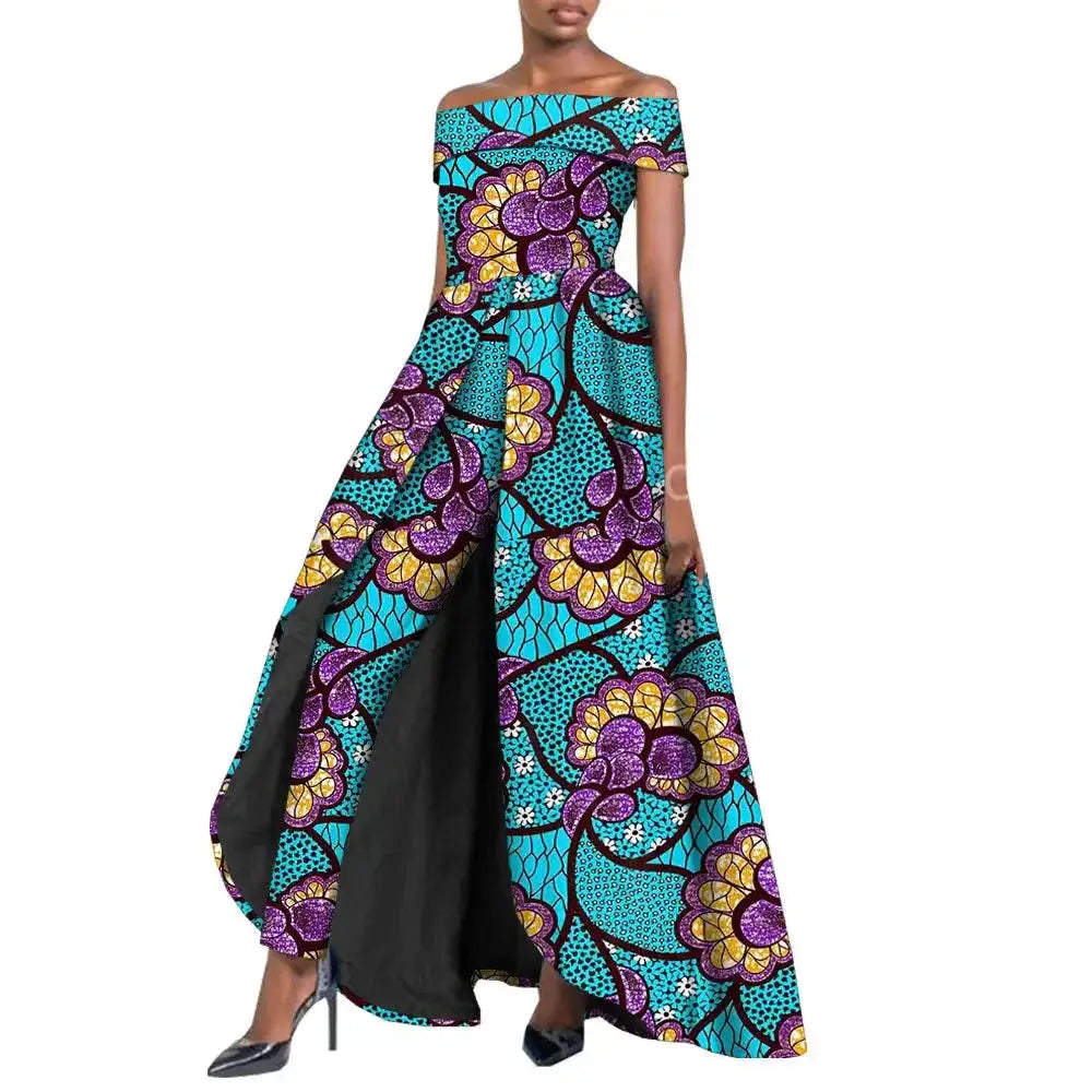 Stylish African pantsuit for women in turquoise and purple floral print. Off-shoulder top with a dramatic cape, custom-fitted for a confident and chic appearance.