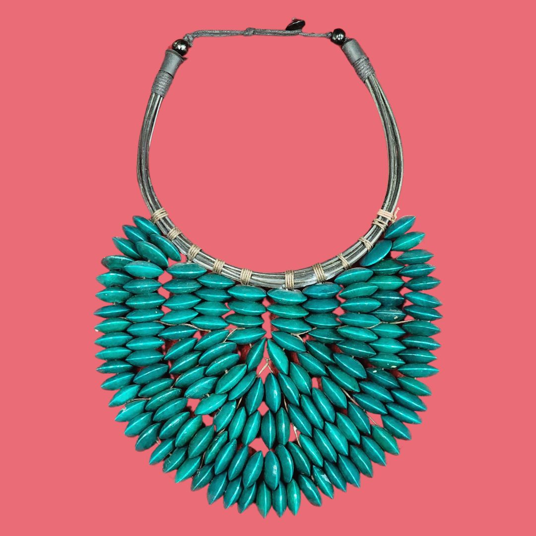 Teal Tempest Bib Necklace, a handmade Bohemian beaded layer necklace with wooden beads, perfect for Memorial Day 2024. Stylish African-inspired statement jewelry.