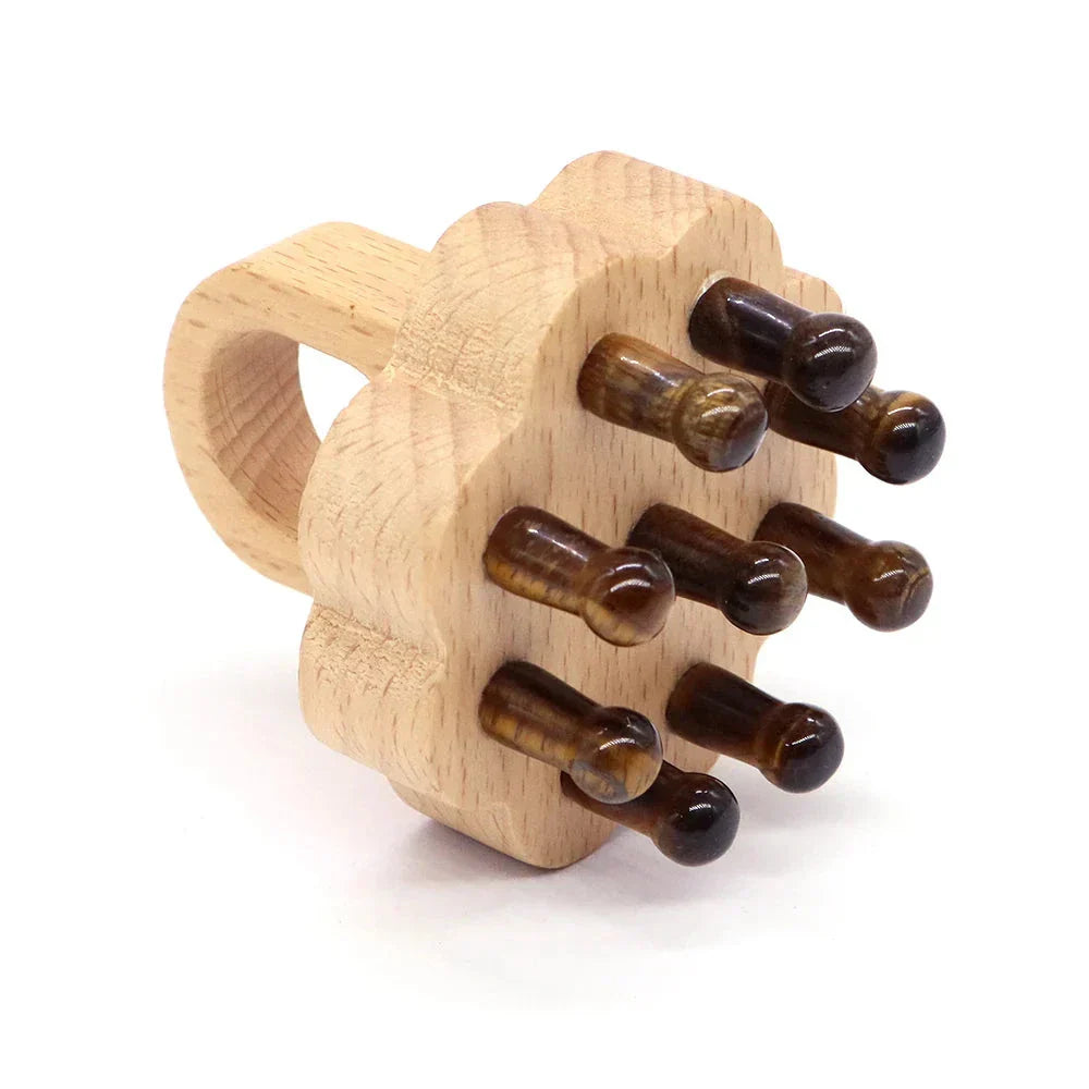 Tiger’s eye crystal scalp massager with a wooden handle. Helps relieve tension and promotes a soothing scalp massage.
