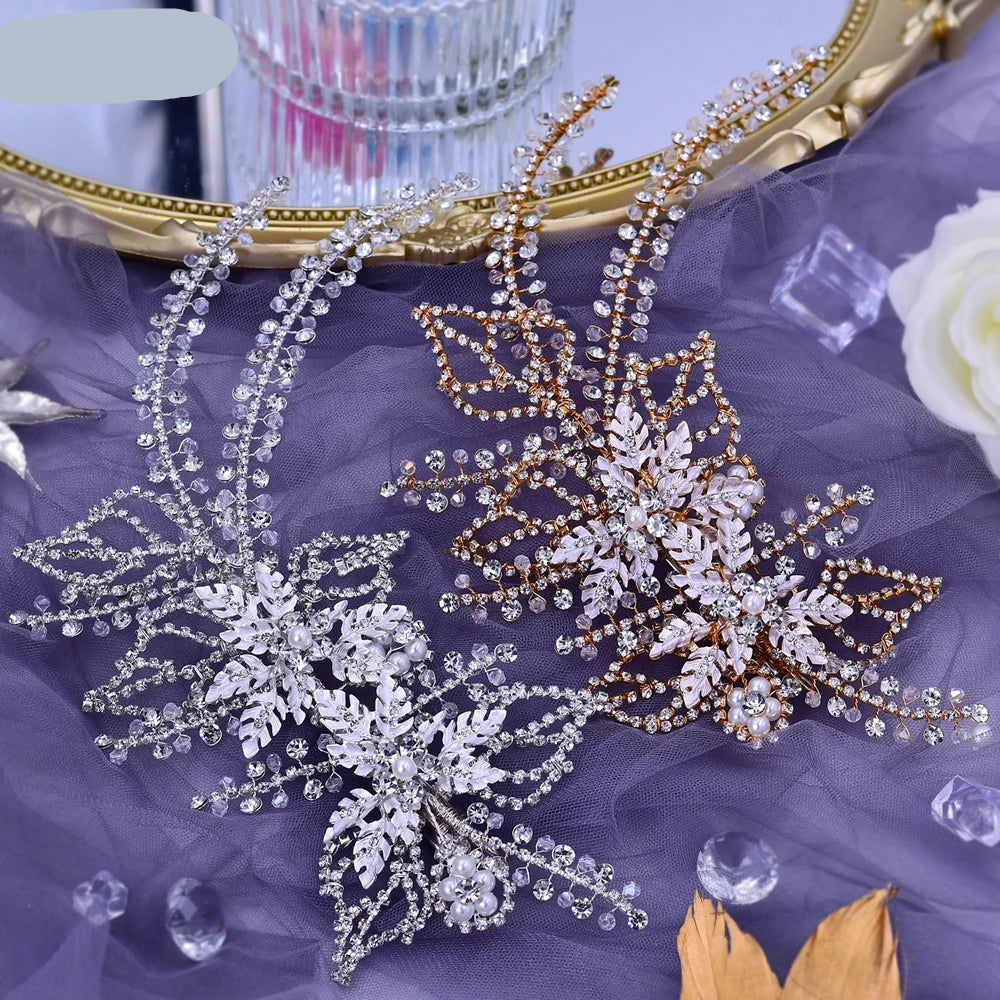 Set of silver and rose gold crystal leaf bridal hairpieces with pearl floral accents displayed on lavender fabric