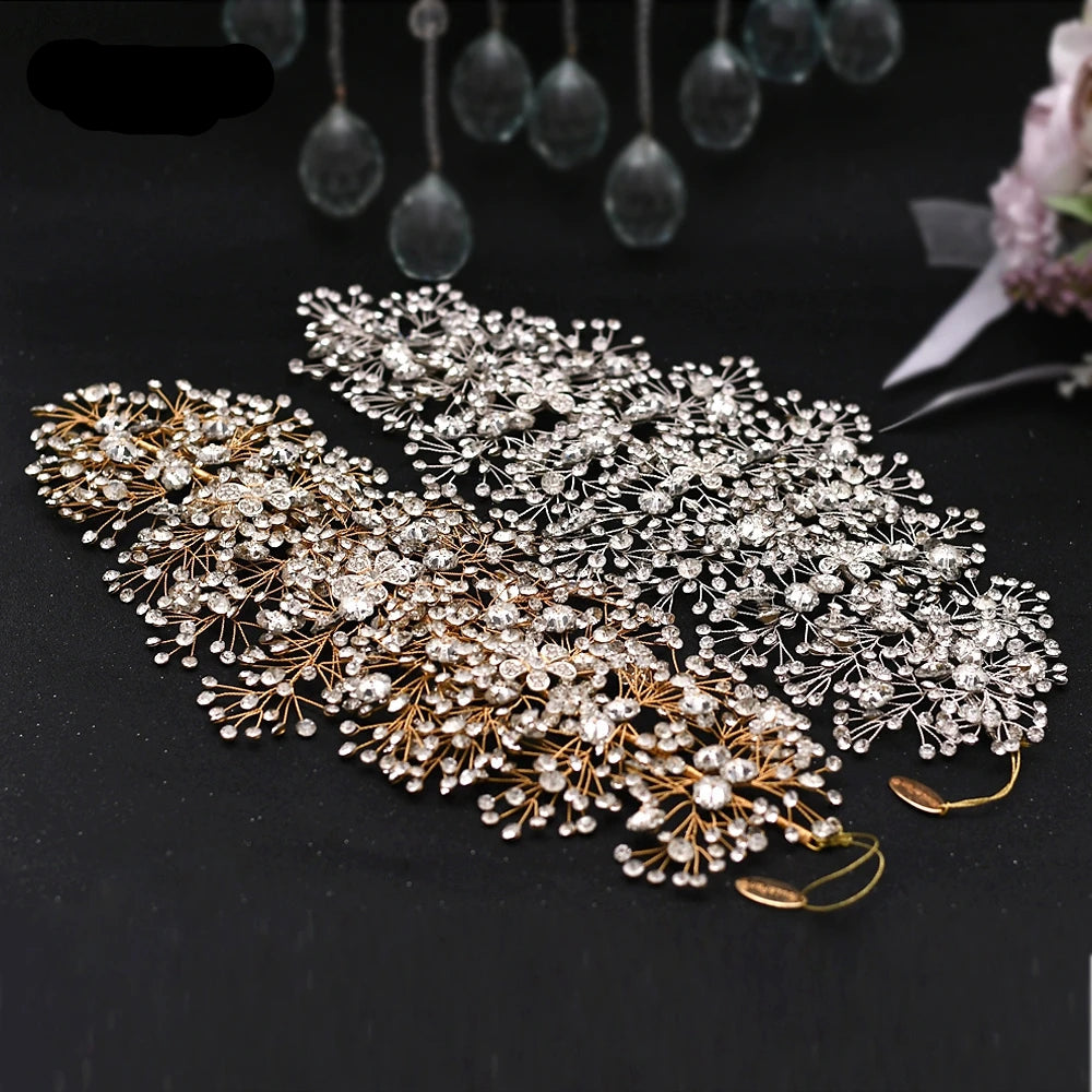 Gold and silver floral rhinestone bridal headpieces displayed side by side on black fabric