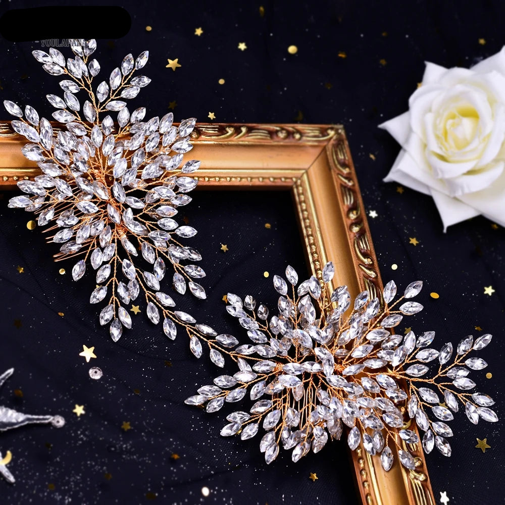 Bride wearing gold floral hair accessories on voluminous wedding updo