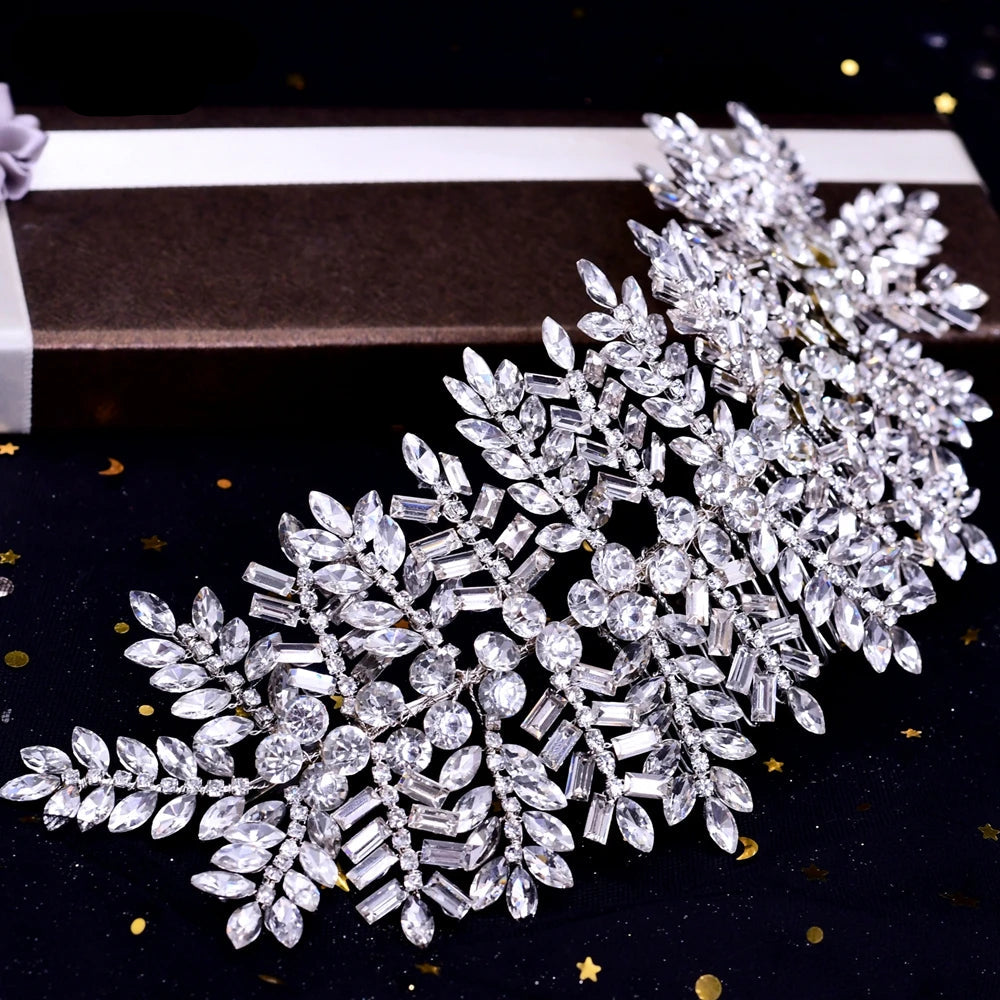 Close-up of silver leaf crystal bridal headpiece with marquise and baguette cut stones