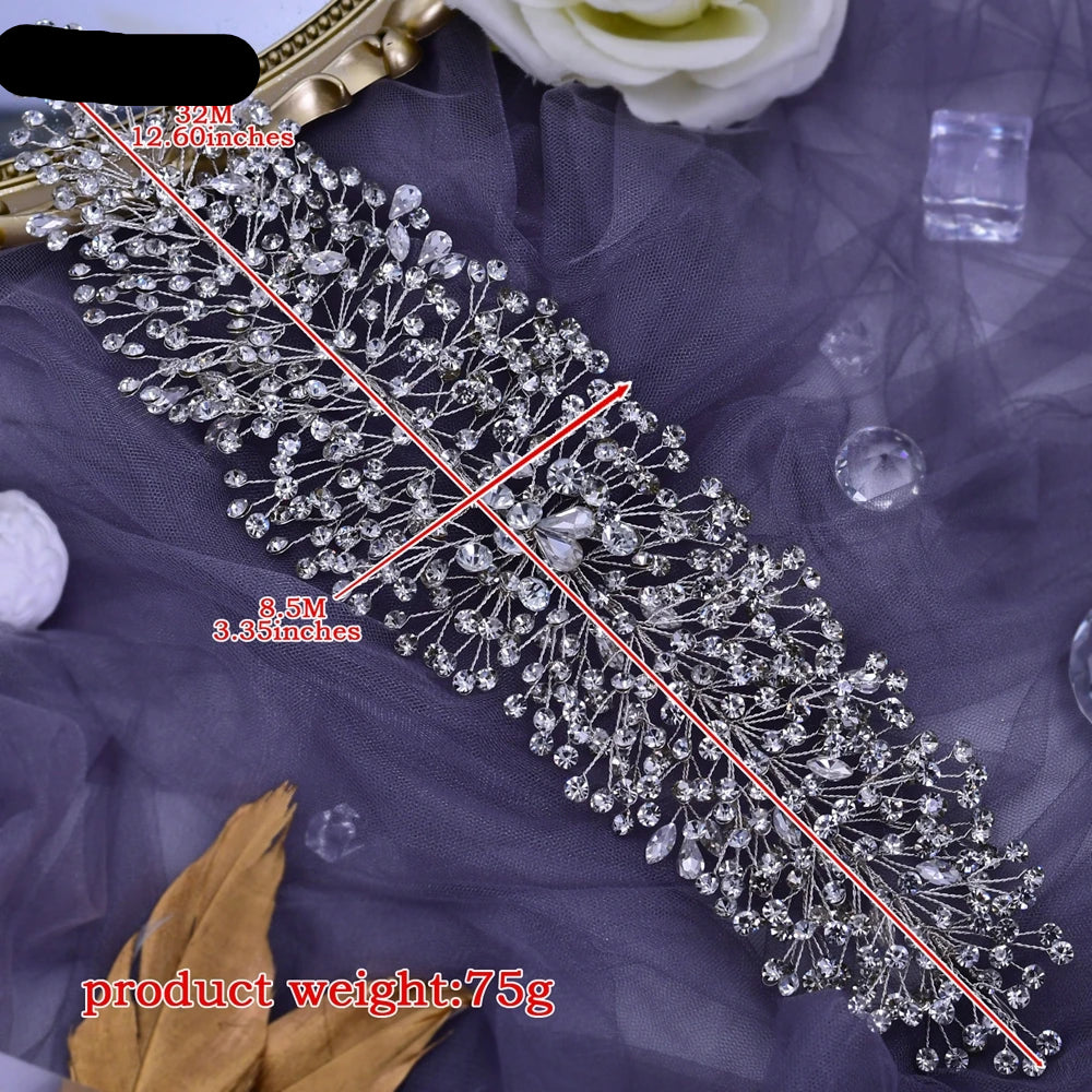 Silver crystal bridal vine hairpiece with measurement 32 cm x 8.5 cm, weight 75 g displayed on lavender fabric