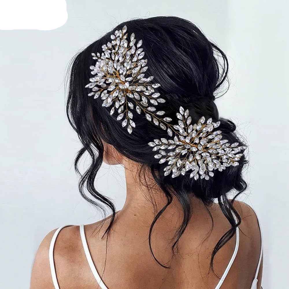 Silver bridal hairpieces with crystal leaf and flower design displayed in gold frame setting