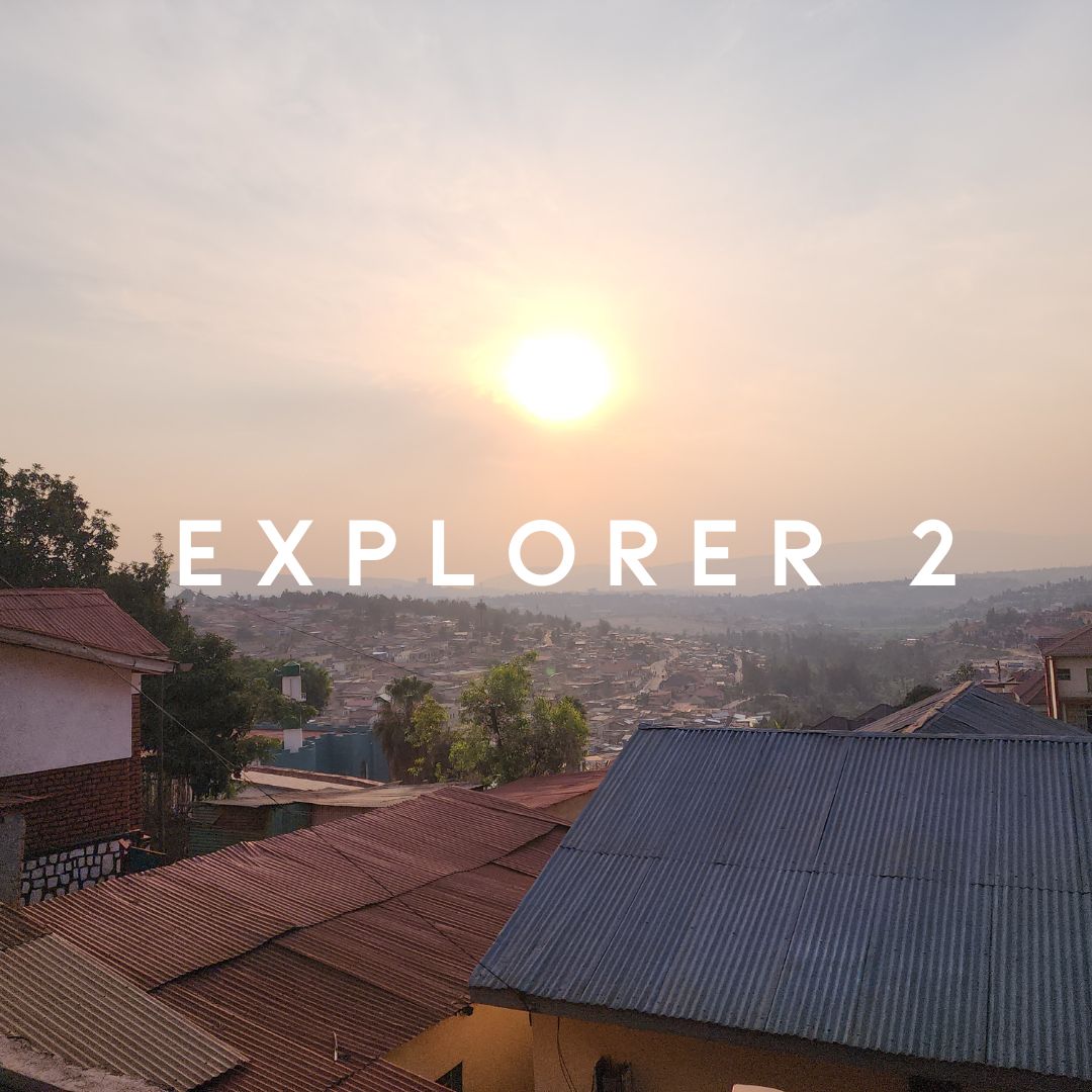 Explore Rwanda Live - Rwanda Walking Tours | Live & Recorded subscription showing a scenic rooftop view of Kigali at sunrise. Ideal for virtual travel fans.