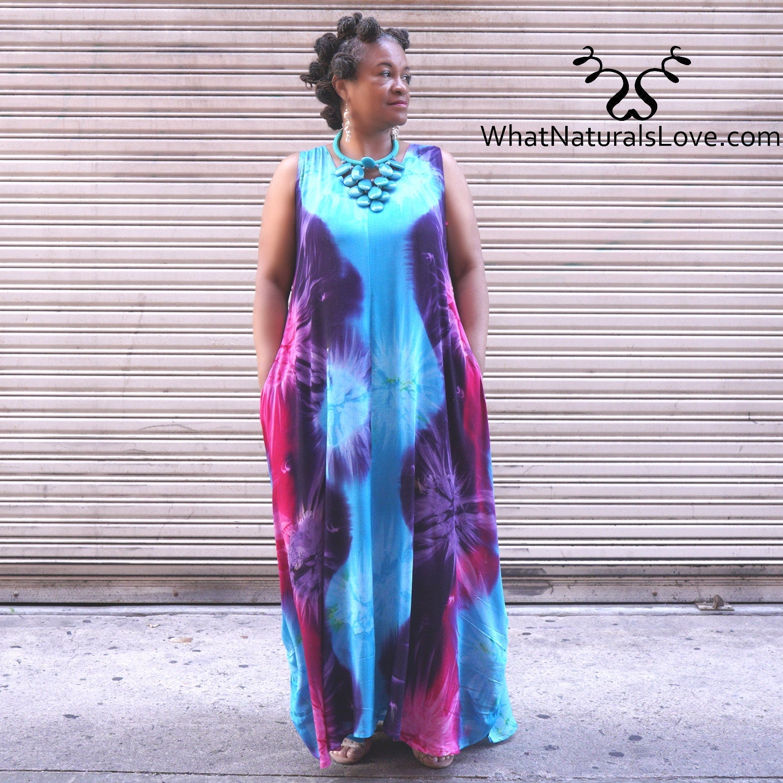 Moroccan Magic Dress Tye Dye worn as a classic sleeveless maxi dress with pockets. A flowing and elegant dress for everyday wear.