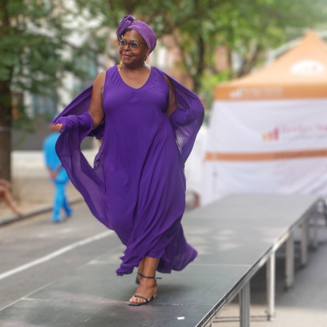 Stylish Moroccan Magic Dress in rich purple, designed for comfort and versatility. This one-size-fits-most maxi dress offers multiple elegant styling options.