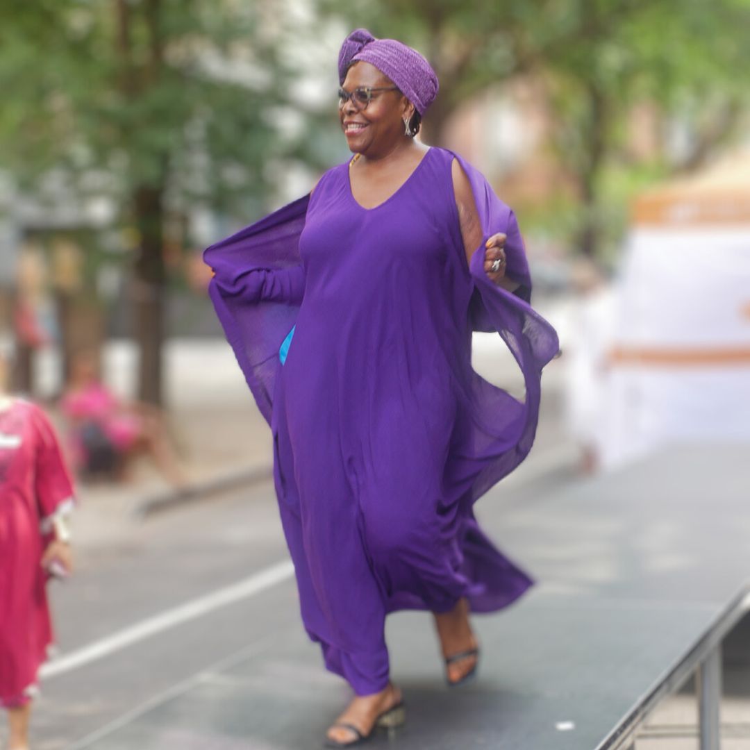 Chic Moroccan Magic Dress in royal purple, a versatile maxi dress with pockets. Designed for effortless elegance and multiple styling options.