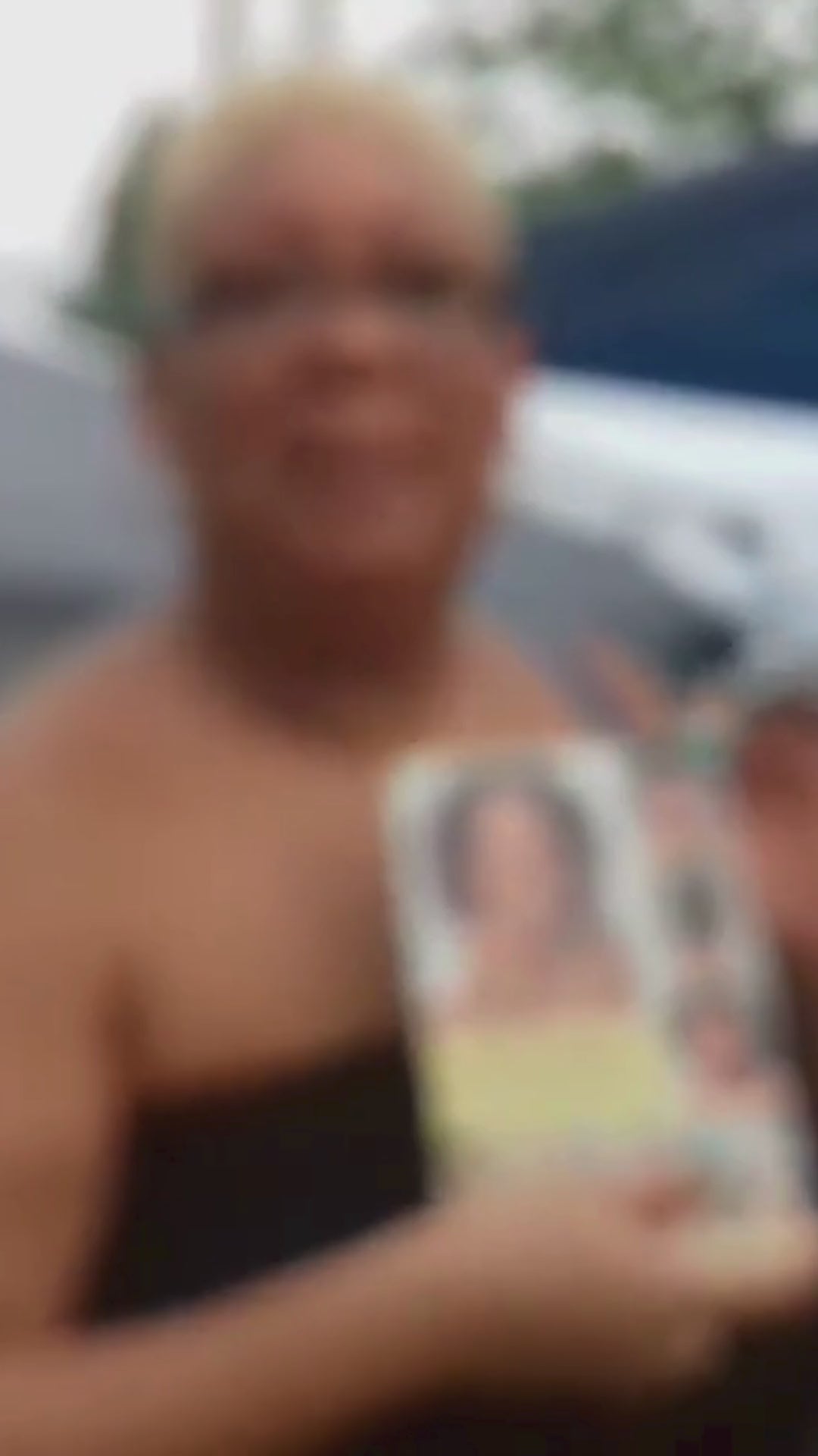 Blurred image of a person holding the book &