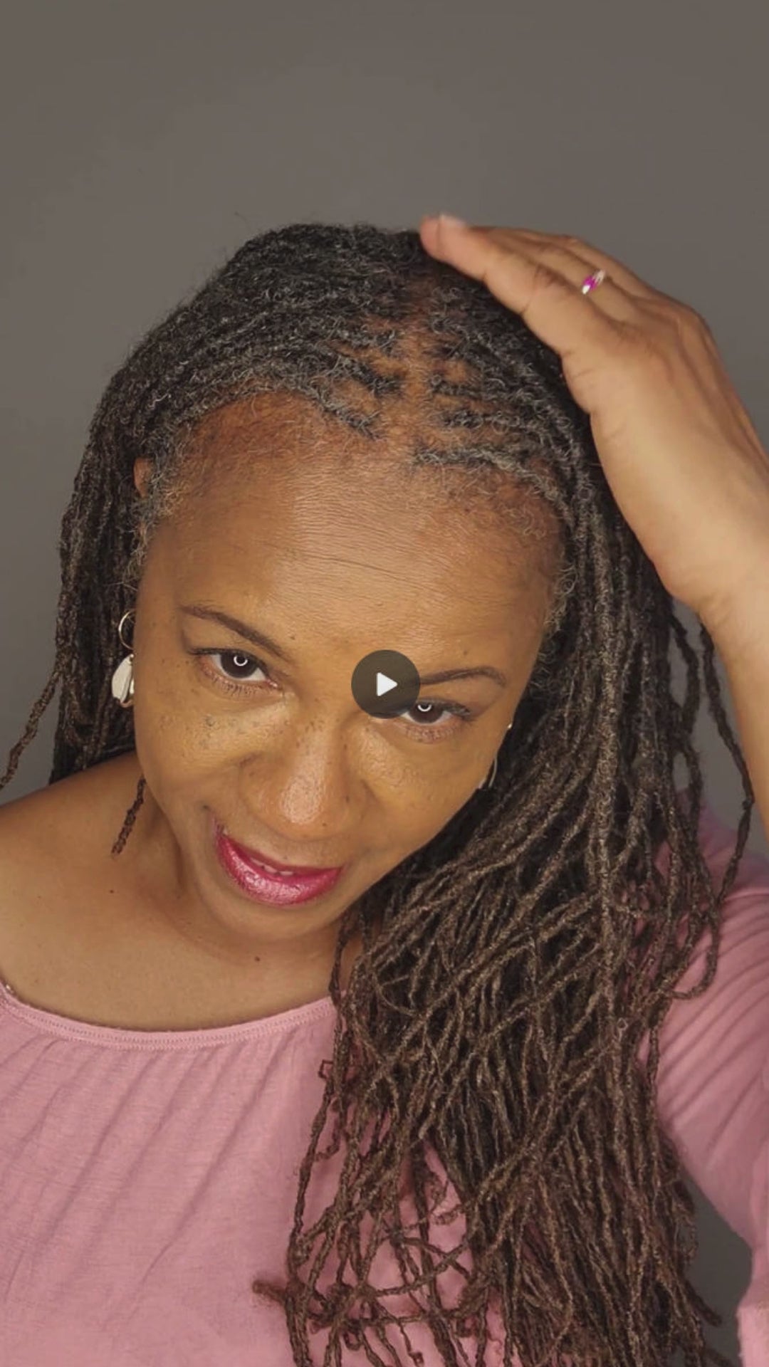 Cryotherapy scalp roller in action, helping to soothe dry scalp and promote hair growth for locs and natural hair.