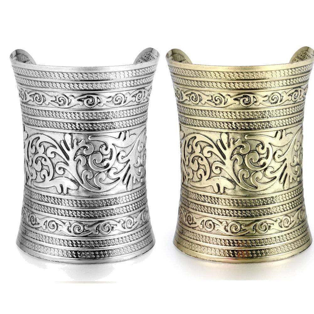 Gold and silver hair cuffs with intricate carvings, ideal for dreadlocks, Sisterlocks, and braids. Stylish and non-damaging hair accessories.