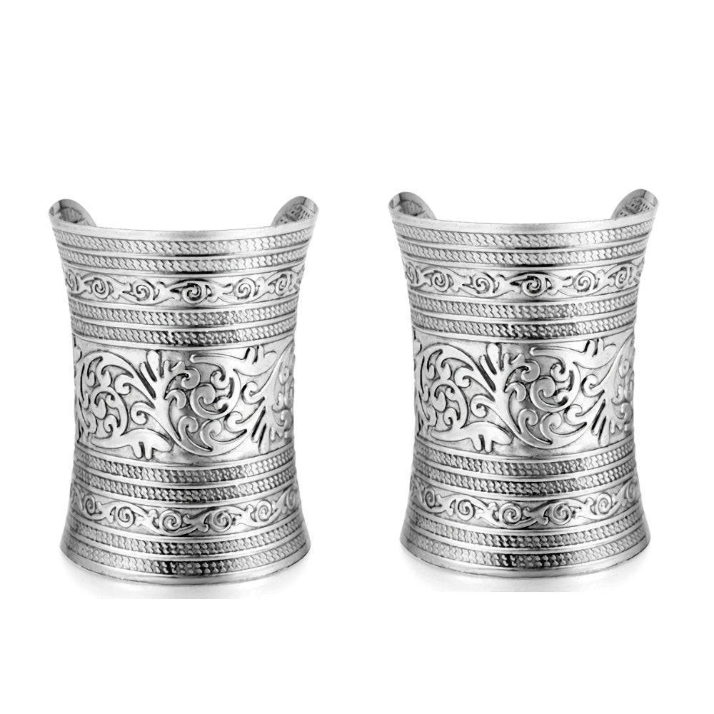Pair of silver hair cuffs with ornate engravings, designed for securing long locs and braids. A fashionable and non-damaging hair accessory.