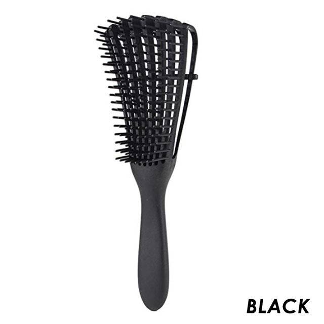 Black Painless Detangler Brush for 4C hair, designed to reduce breakage and define curls with flexible bristles.