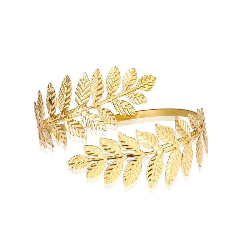Golden leaf-inspired hair cuff for locs, sisterlocks, dreadlocks, and braids. Elegant and non-damaging ponytail holder for stylish hairdos.