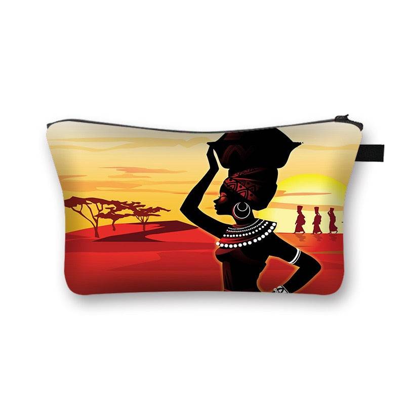African sunset-themed makeup bag featuring a woman carrying a basket. Stylish and lined cosmetic pouch with cultural artwork.