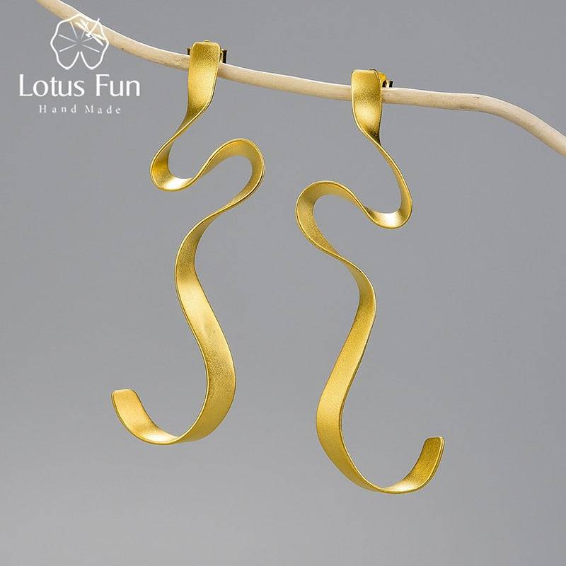 Gold Spiral Curved Long Earrings