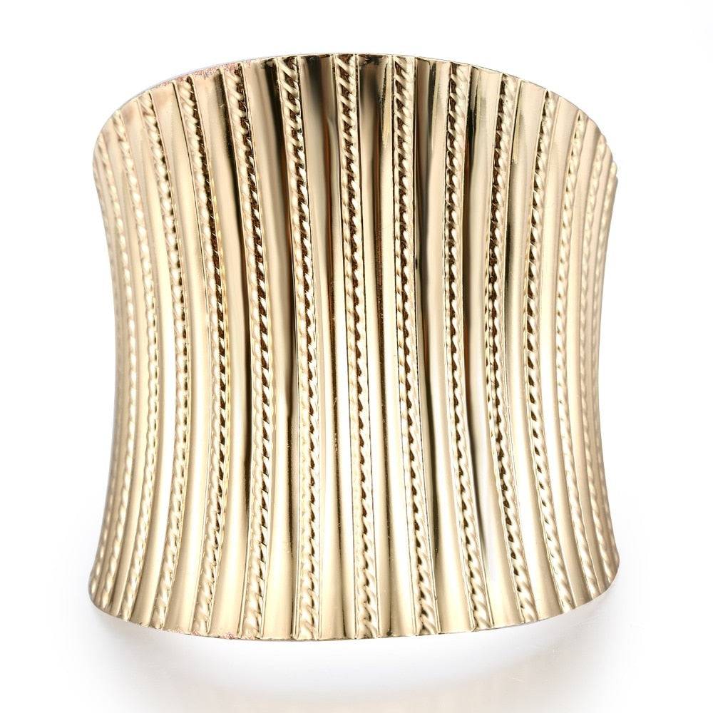 Gold-tone ribbed hair cuff for locs, sisterlocks, dreadlocks, and braids. Adjustable and non-damaging stylish hair accessory.