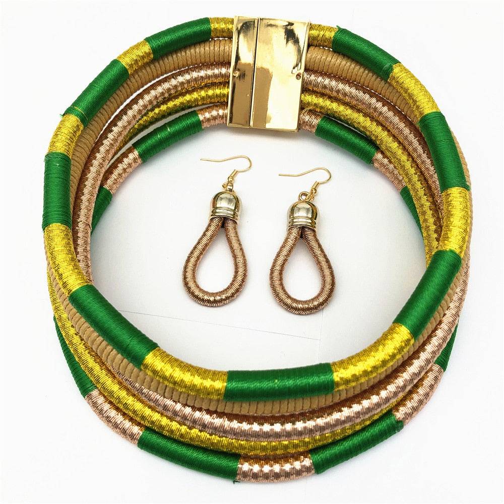 Elegant African choker multi-layer necklace set in green, gold, and brown with matching earrings. A perfect blend of culture and fashion.
