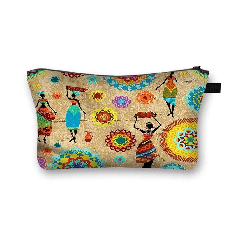 African print makeup bag with dancing women and mandala patterns. Stylish and lined cosmetic pouch with cultural artwork.