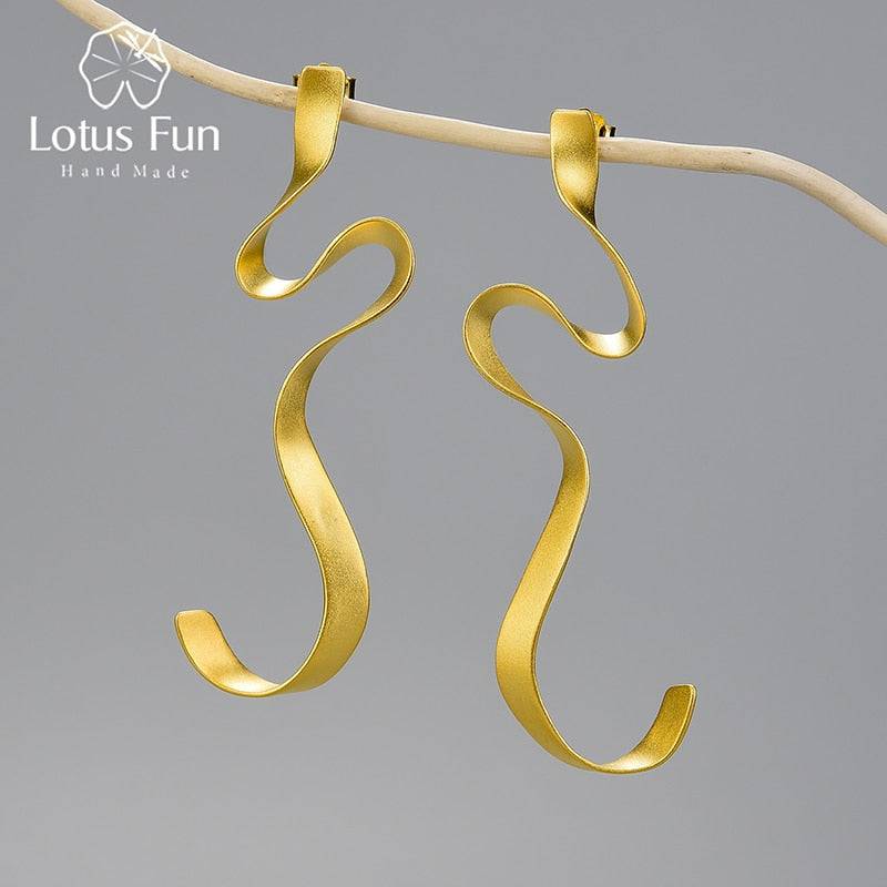 Gold Spiral Curved Long Earrings
