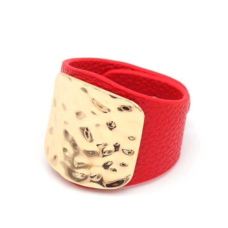 Red leather hair cuff with a hammered gold plate, designed for locs, sisterlocks, and dreadlocks. A stylish and bold hair accessory.
