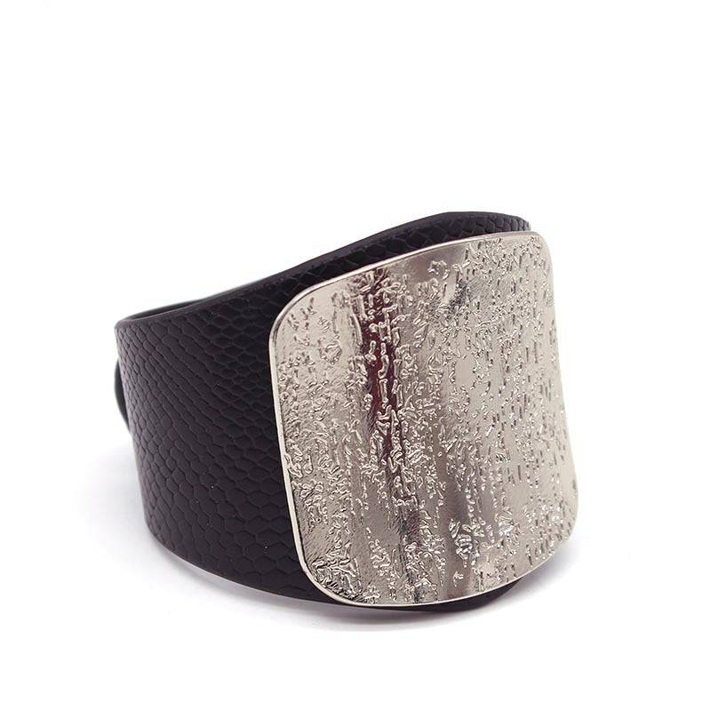 Black leather hair cuff with a textured silver plate, designed for locs, sisterlocks, and dreadlocks. A stylish and non-damaging hair accessory.