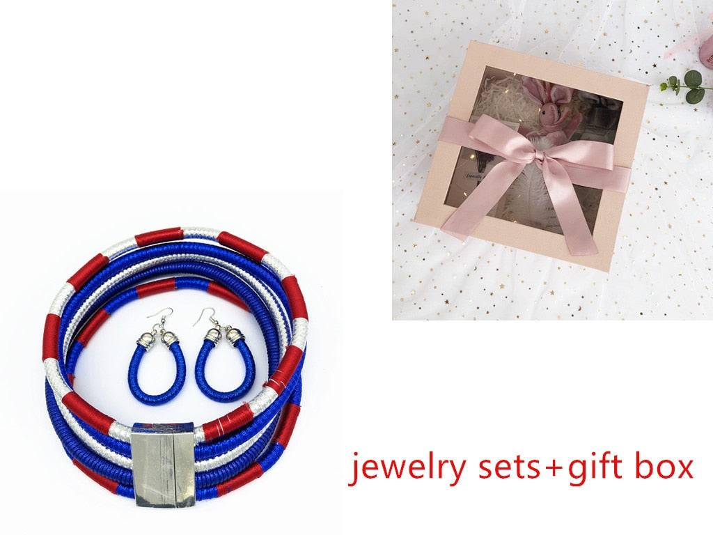 Vibrant blue, red, and silver African choker multi-layer necklace set with matching earrings and a gift box. A perfect jewelry gift for bold fashion lovers.