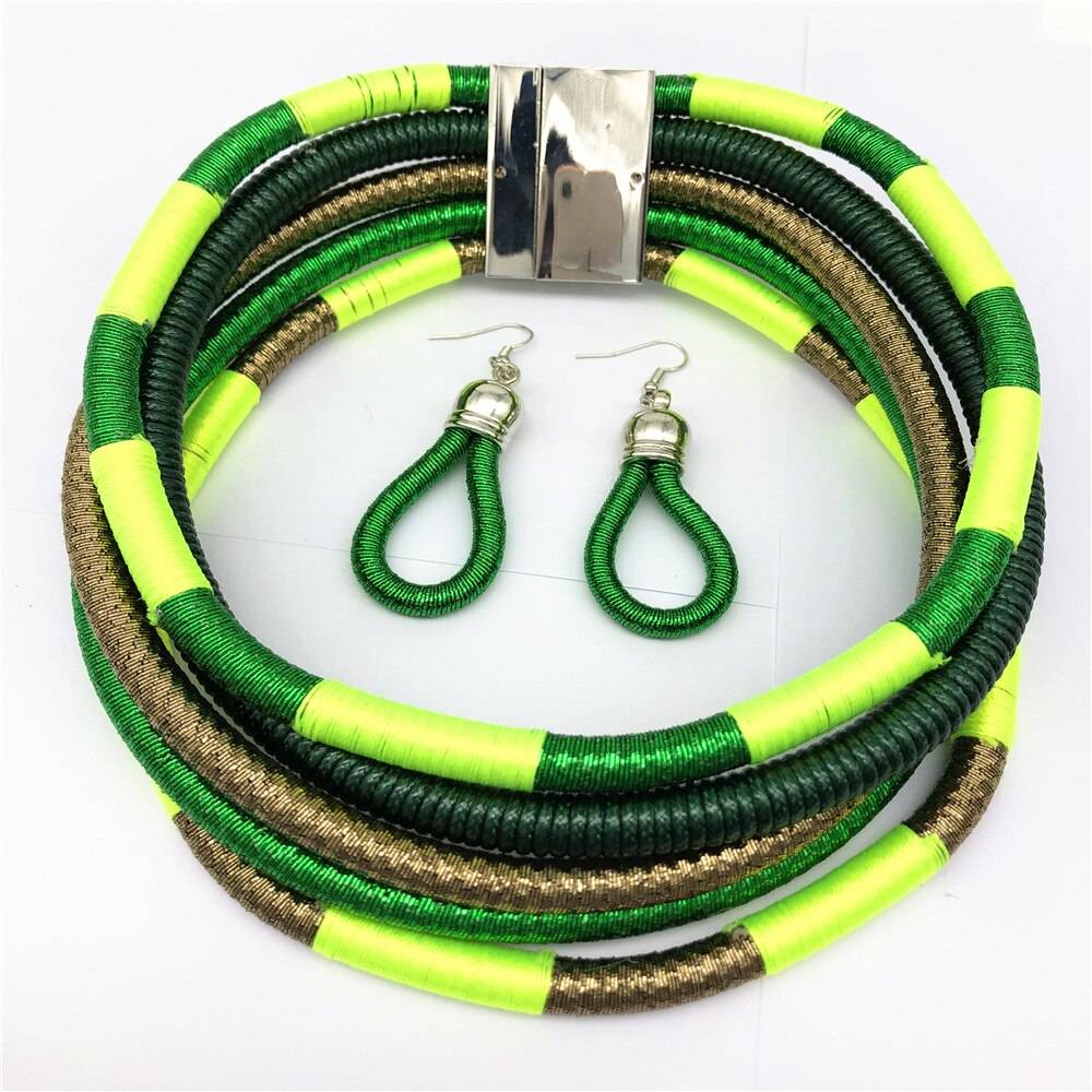 Vibrant green, yellow, and gold African choker multi-layer necklace set with matching earrings. A bold and stylish jewelry piece for cultural fashion.