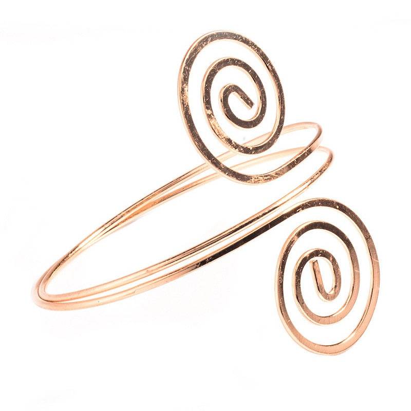 Gold-tone adjustable hair cuff with a unique spiral pattern, ideal for locs, sisterlocks, braidlocs, dreadlocks, and braids. Trendy and non-damaging.