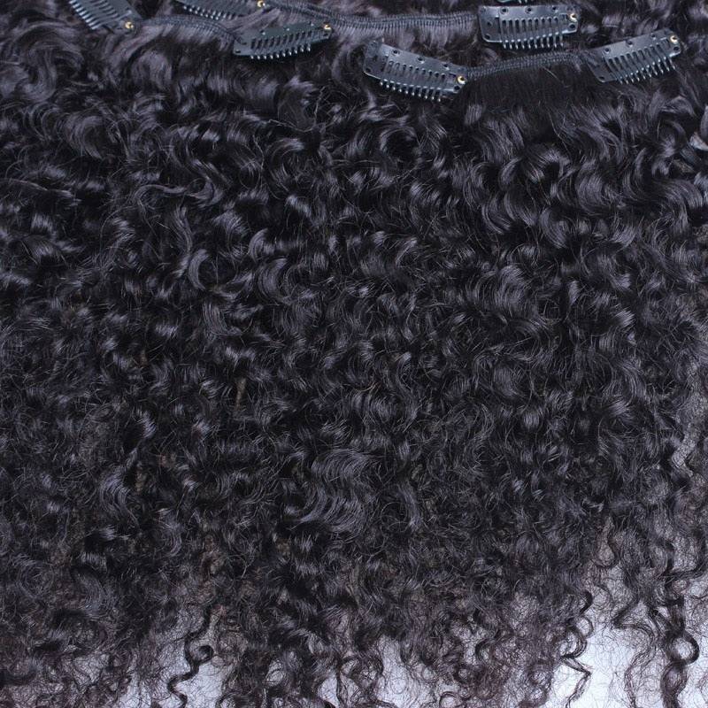 Detailed view of Afro Kinky Curly Clip In Extensions, highlighting the natural curl pattern and secure clip attachments.