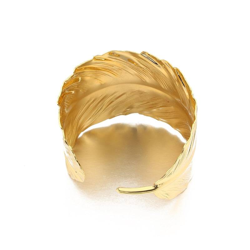 Elegant gold leaf hair cuff with an open design, perfect for securing locs, sisterlocks, braidlocs, dreadlocks, and braids. Minimalist and non-damaging.