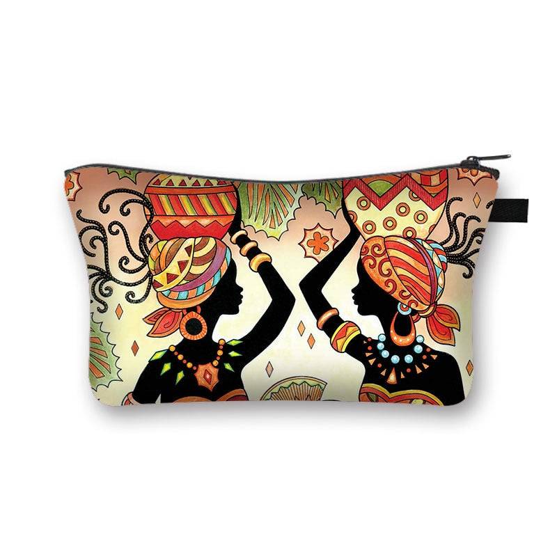 African-inspired makeup bag featuring two women carrying baskets. Stylish and lined cosmetic pouch with cultural artwork.