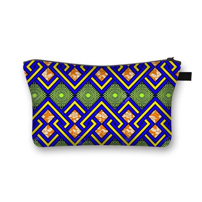 African print makeup bag with blue, green, and yellow geometric patterns. Stylish and lined cosmetic pouch for beauty essentials.