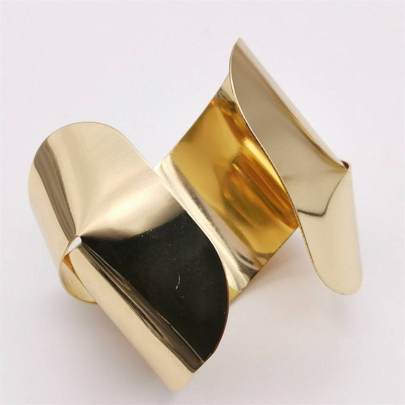 Stylish gold plated hair cuff with a modern, artistic twist, ideal for locs, sisterlocks, braidlocs, dreadlocks, and braids. A non-damaging, fashionable hair accessory.