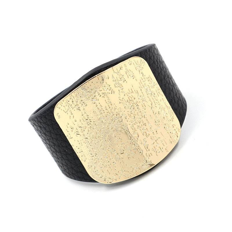 Black leather hair cuff with a textured gold plate, perfect for locs, sisterlocks, and dreadlocks. A bold and elegant hair accessory.