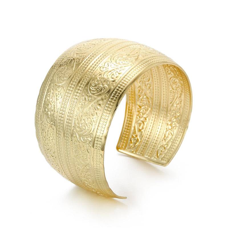 Bengali gold hair cuff with ornate floral engravings for locs, sisterlocks, dreadlocks, and braids. Stylish and non-damaging ponytail holder.