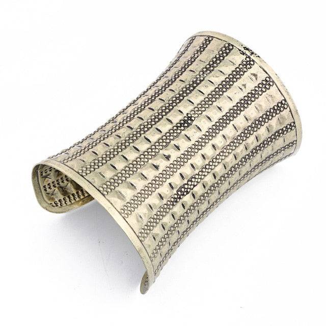 Silver-tone engraved hair cuff with intricate tribal patterns for locs, sisterlocks, dreadlocks, and braids. Adjustable and non-damaging hair accessory.